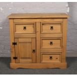 A modern pine side cabinet 92cm x 44cm, 83cm high.