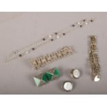 A collection of silver jewellery to include earrings, bracelets, etc.