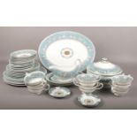A Wedgwood turquoise Florentine pattern part dinner service. Approximately 40 pieces. Including