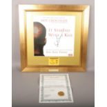 A framed Hot Chocolate 'It started with a kiss' record cover and concert ticket, autographed by