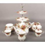 A quantity of Royal Albert old country roses teawares to include cake stand, teapot, cup etc.