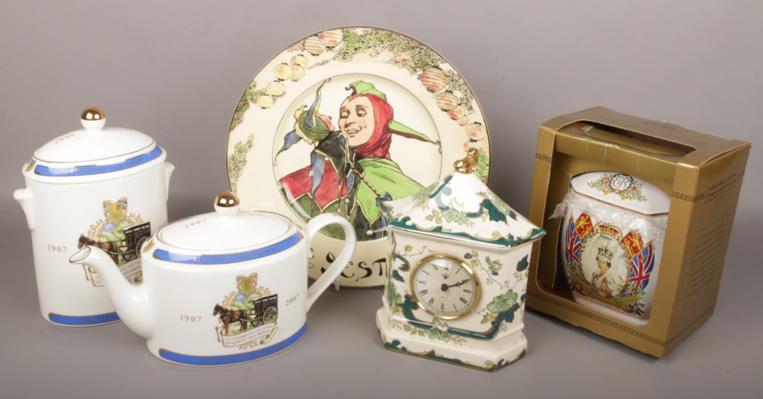 A Ringtons centenary teapot and caddy, Ringtons Golden Jubilee caddy a Royal Doulton Jester plate