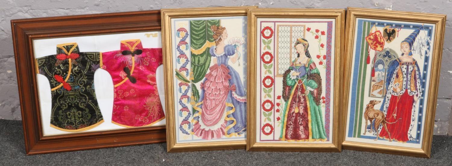 A collection of framed embroideries, to include an oriental fabric picture.