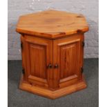 A pine hexagonal centre cabinet.