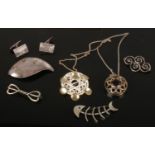 A collection of silver and white metal jewellery marked for Denmark, Norway and Sweden