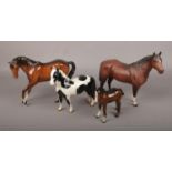 Four Beswick ceramic figures of horses, to include bisque example. Good condition.