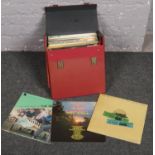 A carry case of LP records to include The Beatles, Simon & Garfunkel, The Seekers etc.