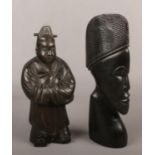 A 20th century Chinese bronze sculpture of a sage dressed in a long robe. Along with an African