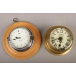 A Mercer 8 day chrome plated ships wall clock on wooden plinth incorporating subsidiary seconds