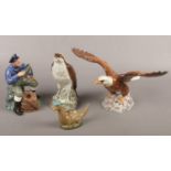 A Royal Doulton figure The Lobster Man HN2317, Beswick Osprey decanter, Beswick Bald Eagle and a