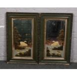 A pair of hand painted mirrors, decorated with swans.
