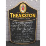 A Theakston pub board sign.