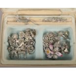 A box of vintage costume jewellery, mainly marcasite pieces.