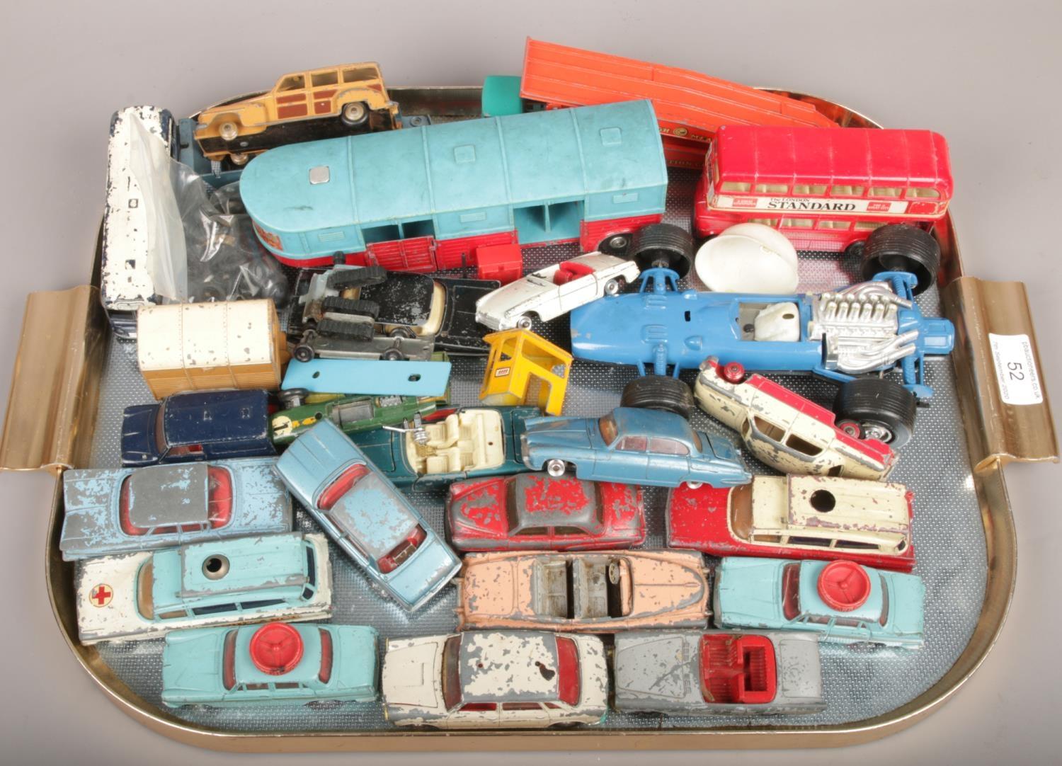 A tray of vintage die cast model vehicles and parts including Corgi and Dinky. Heavily play worn.