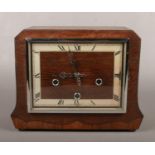 An Art Deco oak cased 8 day Enfield Westminster chiming mantel clock with chrome bezel, 29cm wide.