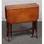 A Victorian mahogany Sutherland table.