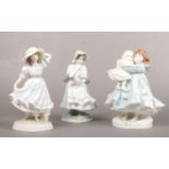 A collection of Royal Worcester figurines, ' Grandma's bonnet', ' A posy for mother' ' Love'