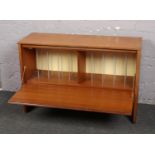 A teak record cabinet.