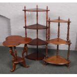 An inlaid walnut whatnot stand, along with a mahogany example and a carved mahogany trefoil