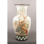 A large decorative Chinese pottery baluster vase decorated with peacocks. (Height 49.5cm). Good.