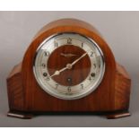 A Garrard 8 day Westminster and Whittington mantel clock in walnut case and housing a movement