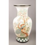 A large decorative oriental style baluster shape vase. (Height 52cm).