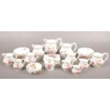 A collection of Royal Crown Derby bone china, in the Derby Posies design (approximately 16 pieces).
