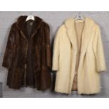 Two ladies vintage 3/4 length fur coats.