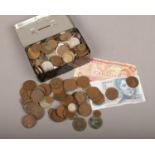 A collection of British pre decimal and world coins.