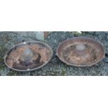 Two cast iron Mexican hat shaped troughs. One with crack.