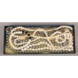 A collection of pearl necklets and bracelets including freshwater examples.