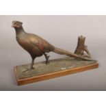 A spelter table lighter formed as a pheasant.