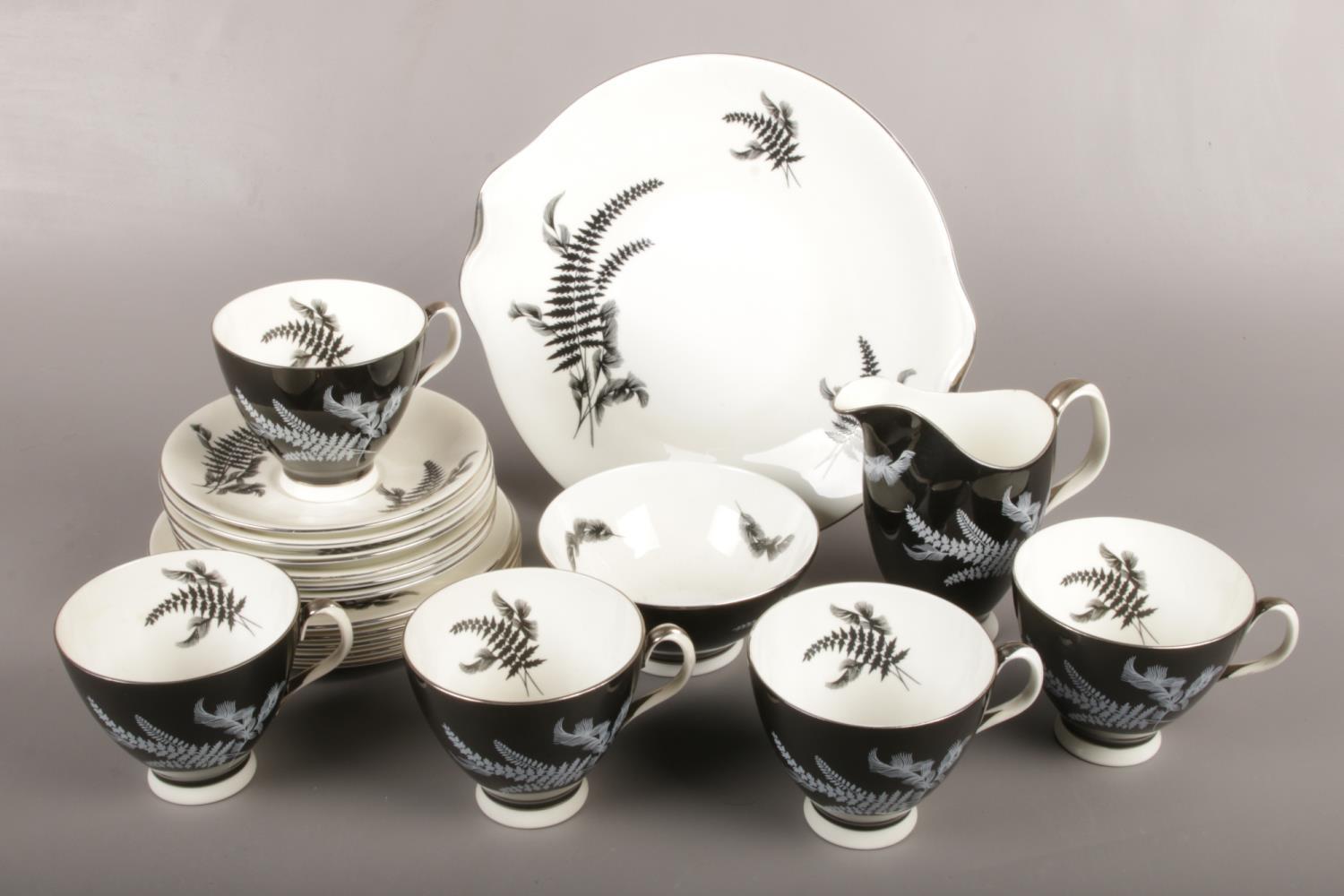 A collection of Royal Albert bone china teawares, in the Night and Day pattern.