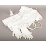 A Child's vintage Catholic first communion outfit, 2 pairs of gloves, dress etc