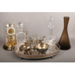A mixed group, to include silver plate, cut glass decanters, torsion clock etc.