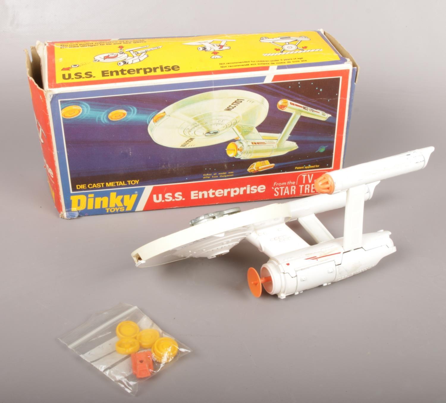A vintage boxed Dinky Star Trek U.S.S. Enterprise diecast model.