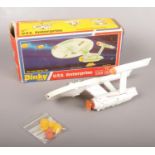 A vintage boxed Dinky Star Trek U.S.S. Enterprise diecast model.