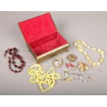 A jewellery casket and contents of jewellery, to include 9ct gold cross pendant, hand painted