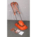 A Flymo Turbo Lite 330 electric hover lawn mower. With instructions and blade spanner. Used twice,