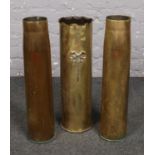Three large brass world war one shell cases, one marked Magdeburg.