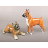 A Royal Doulton porcelain figure of a Boxer dog, Warlord of Mazelaine, along with a Western