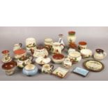 A collection of pottery, mostly mottoware, to include Dartmouth Watcombe etc.