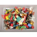 A tray of vintage toys including Crescent Toy Co. plastic cowboys, Indians and soldiers.