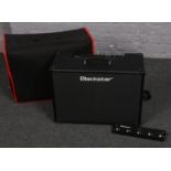 A Blackstar 100 Watt Stereo Guitar Amplifier Model ID Core 100 with FS 12 foot controller and cover