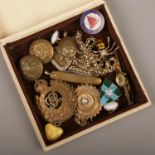 A box of jewellery and collectables including Victorian brooches, Royal Engineers cap badge and