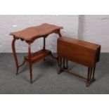 A Victorian mahogany window table, along with a small mahogany Sutherland table.