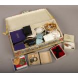 A box of costume jewellery to include silver jewellery, simulated pearls, gold plate bangles etc.