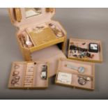 A jewellery box and contents of costume jewellery, to include wristwatches, earrings, necklaces etc.