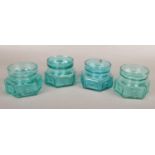 Four Dartington glass hexagonal candle holders by Frank Thrower. FT88 with moulded panel and spot