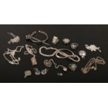 A box of silver jewellery, earrings, pendants, torque brooch, abalone shell pieces and a marcasite